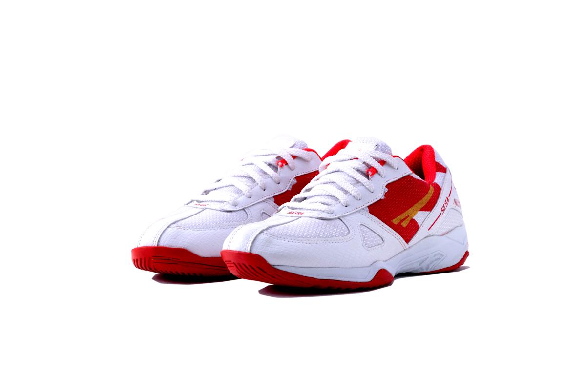 SEGA Swift Badminton Shoes front angled view in white red colour with non marking cushioned sole